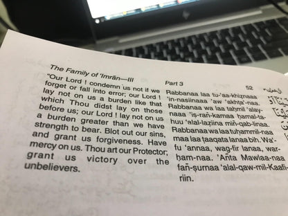 The Holy Qur'an: Transliteration in Roman Script with Arabic Text and English Translation